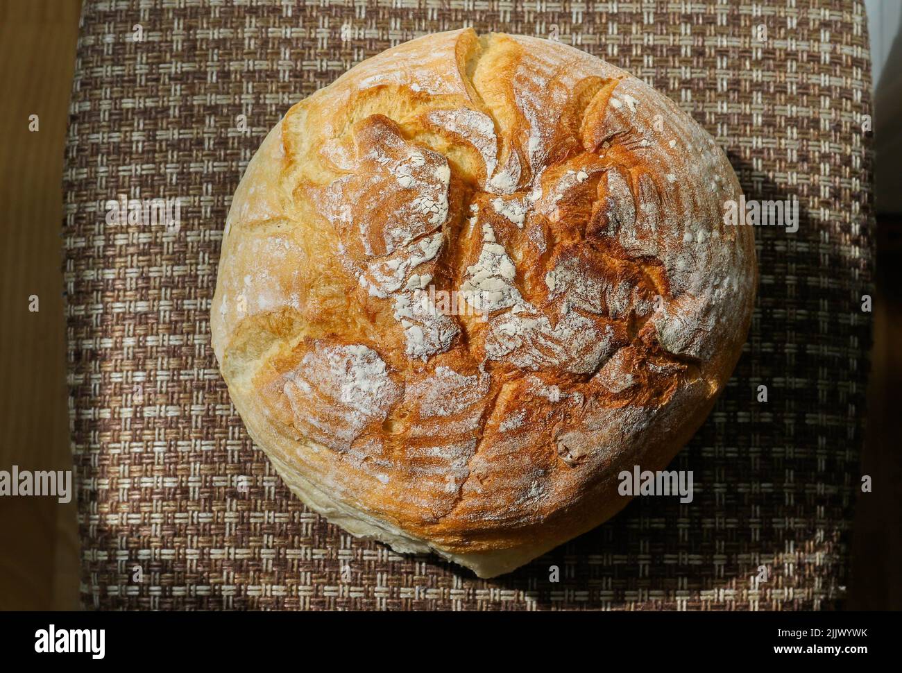 Bread is a staple food prepared from a dough of flour (usually wheat