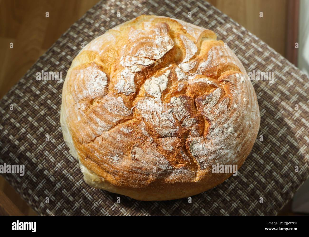 Bread is a staple food prepared from a dough of flour (usually wheat