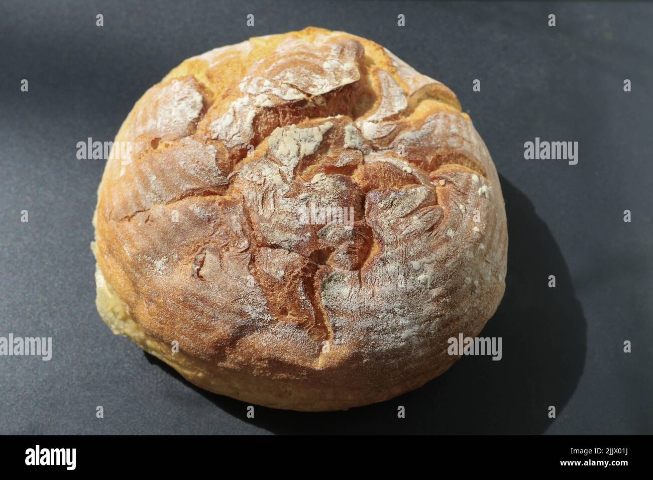 Bread is a staple food prepared from a dough of flour (usually wheat