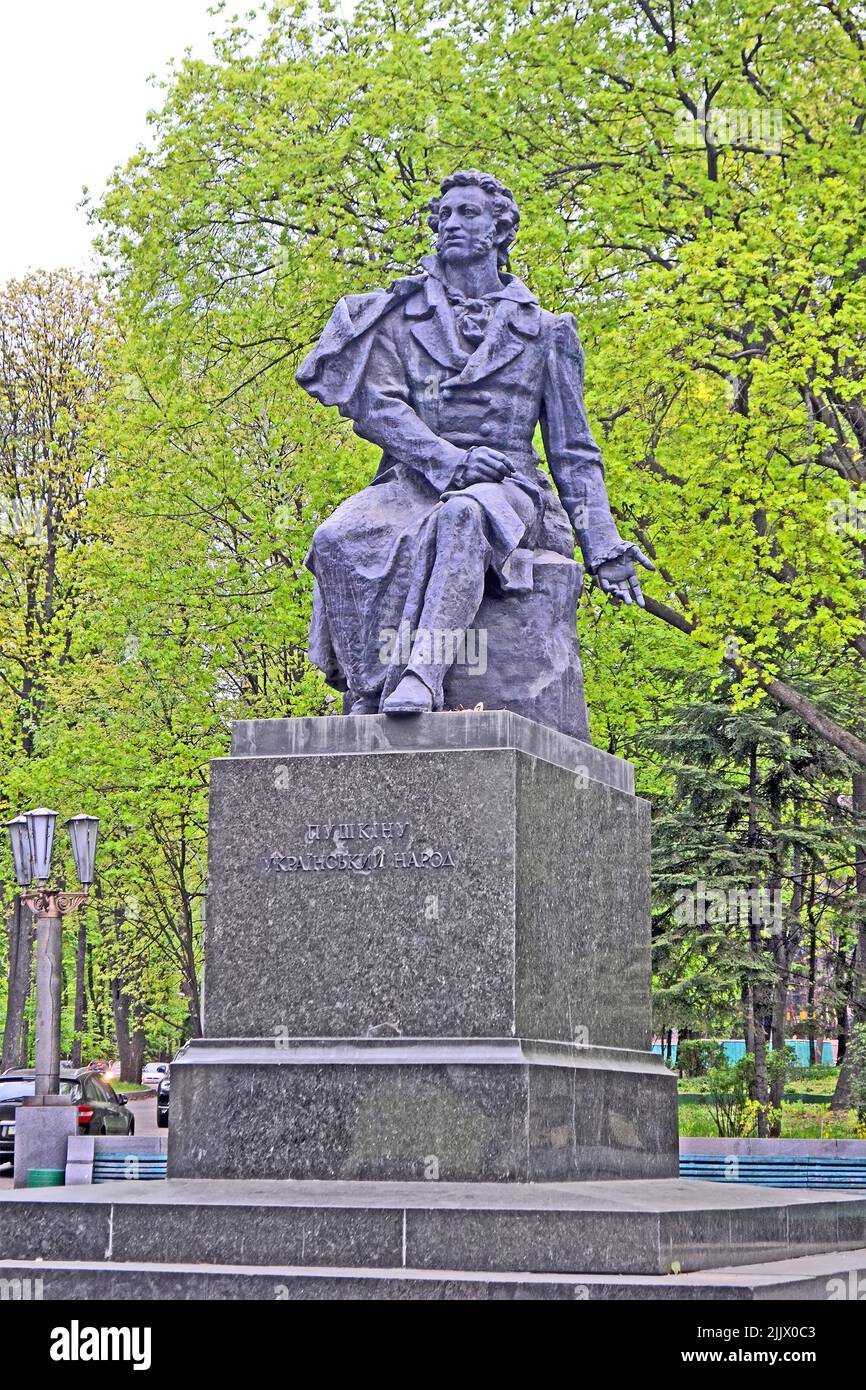 Alexander Pushkin, famous Russian poet, verse writer. Stone monument under green trees in Kiev, Ukraine. Stock Photo