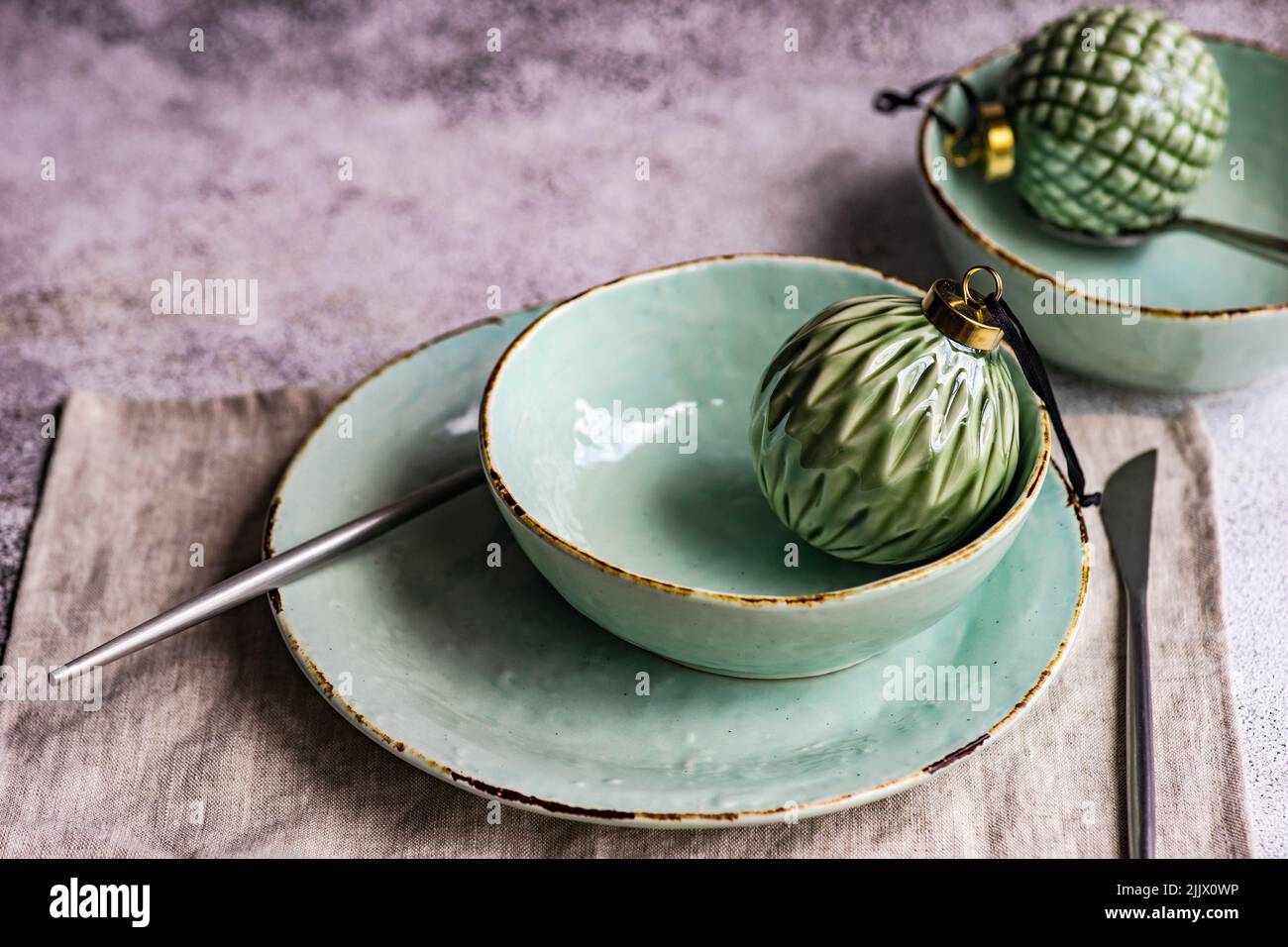 Vintage ceramic Christmas balls in interior decoration on concrete background Stock Photo