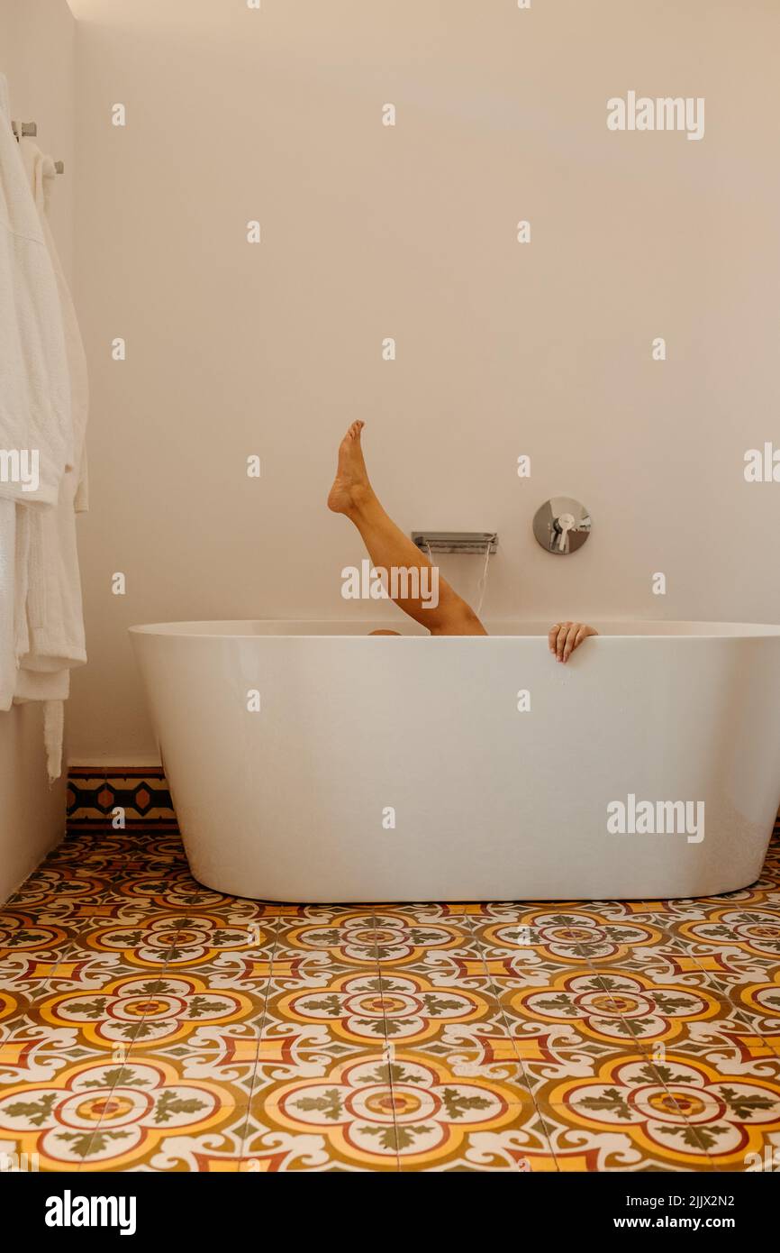 Relaxing woman in bathtub hi-res stock photography and images - Alamy