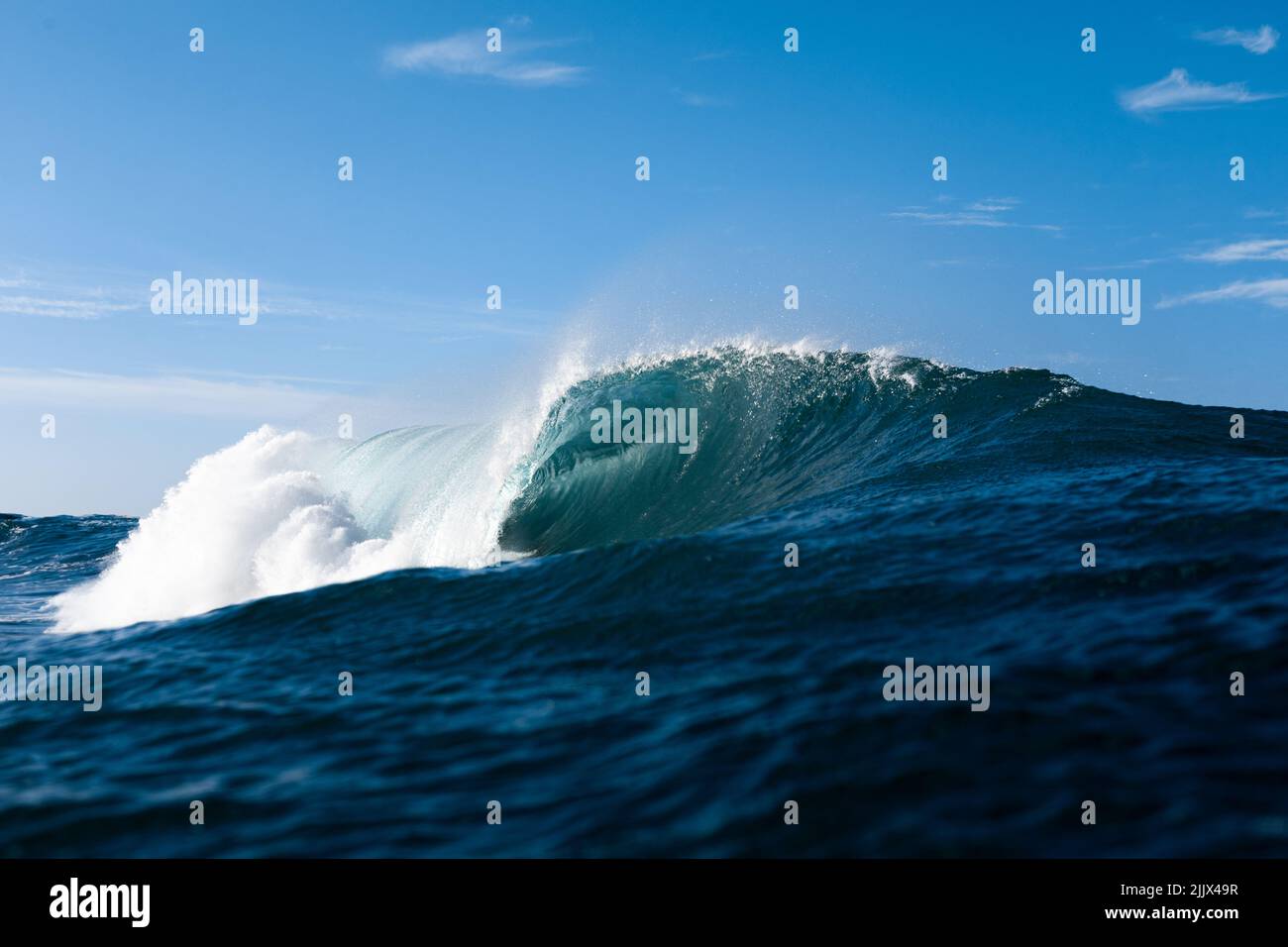Powerful foamy sea waves rolling and splashing over water surface ...