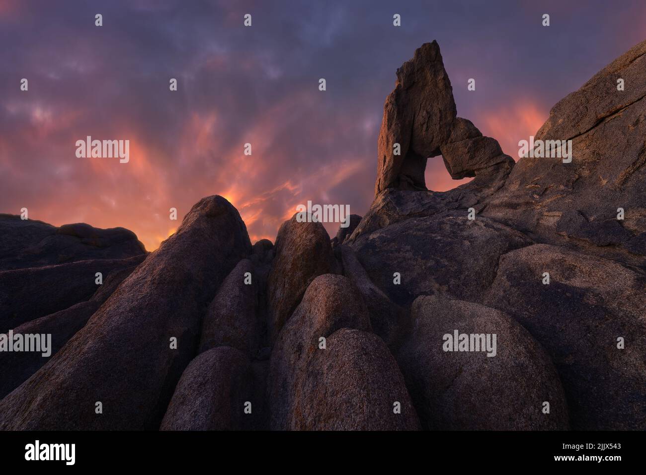 Famous rocky Boot Arch located against sunset sky in Alabama hills in ...