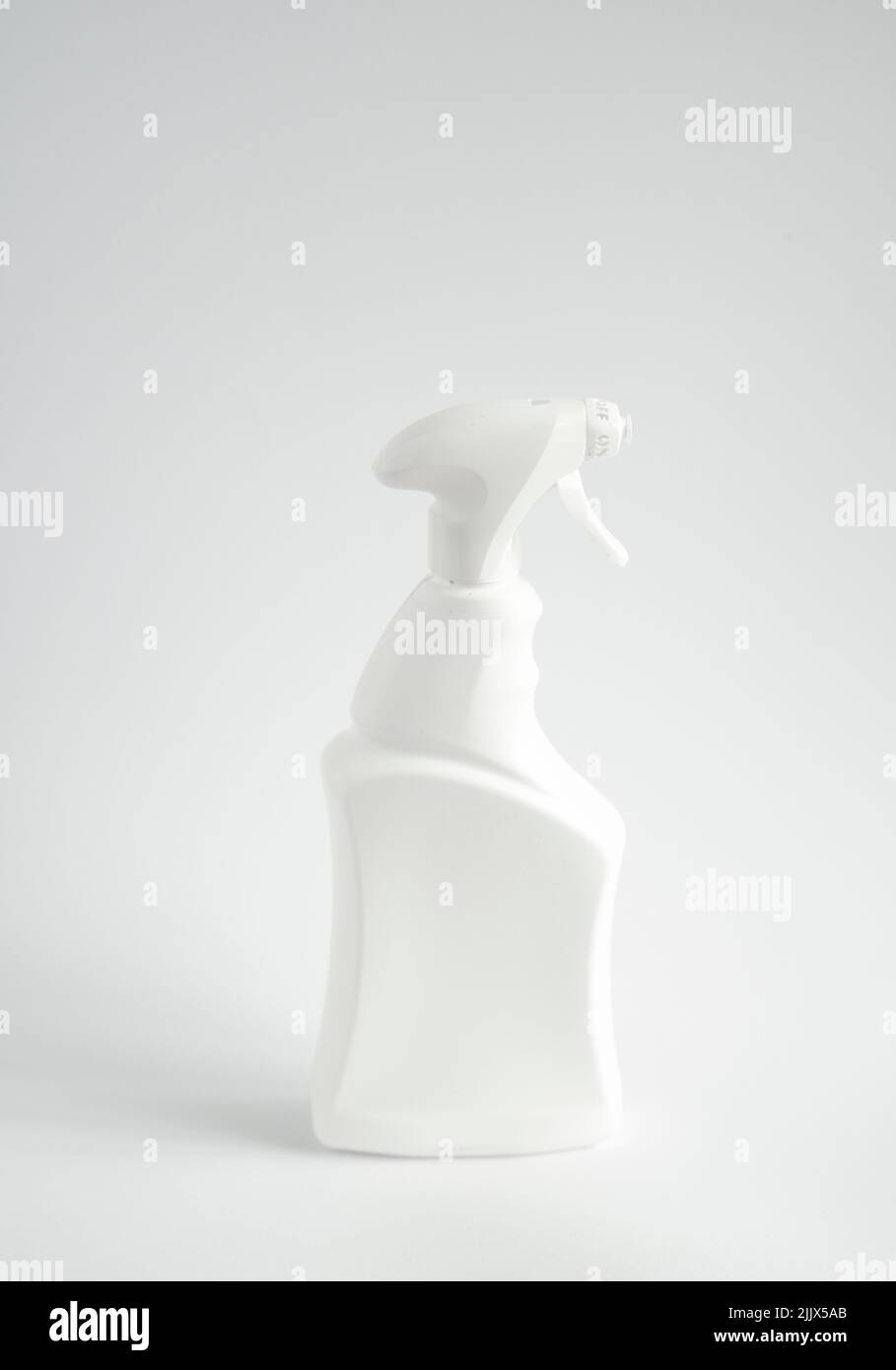 White blank plastic spray detergent bottle isolated on white background