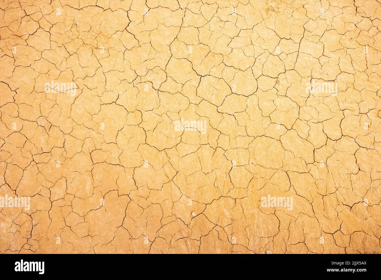 Top view closeup textured background of rough cracked barren waterless ...
