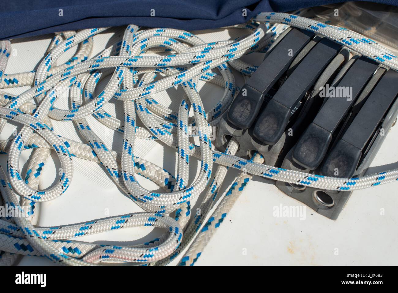 A top view of ropes and knots of a white boat on a sunny day Stock ...