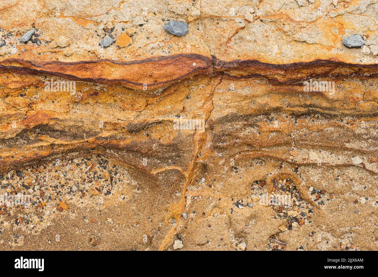 Rain Changes Rocks Recent rain enhances the color in mineral-stained cliff face rock on ...