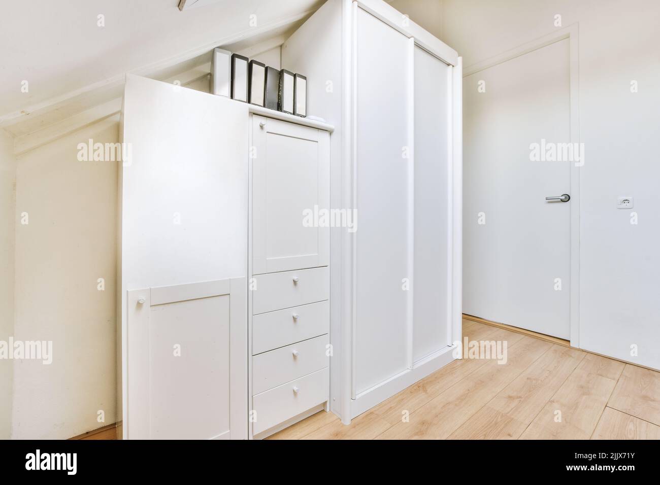 Interior of a modern house with clothes closets and file next