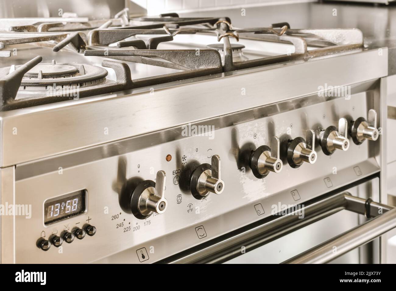 Detail of the controls of a silver colored kitchen oven Stock Photo Alamy