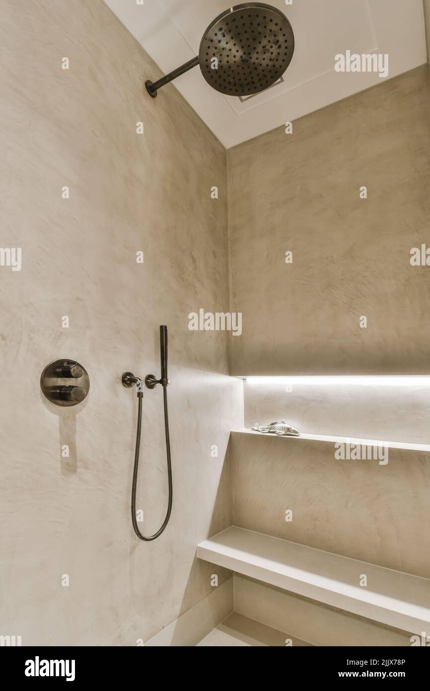 Shower on wall in luxurious bathroom Stock Photo