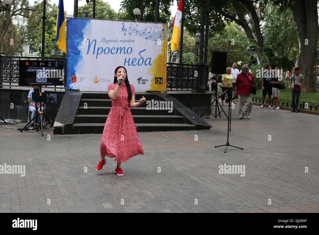 Odessa, Ukraine. 24th July, 2022. The singer Odette Imperiale seen performing in Odessa region during the event. Multicultural poetic and vocal evening 'The ark of inspiration.' Poems and songs in Ukrainian, Polish, English, German, Spanish and French. A monitor was installed for the audience with the translation of works. The goal was to support the civilian population during the war with Russia. (Photo by Viacheslav Onyshchenko/SOPA Images/Sipa USA) Credit: Sipa USA/Alamy Live News Stock Photo
