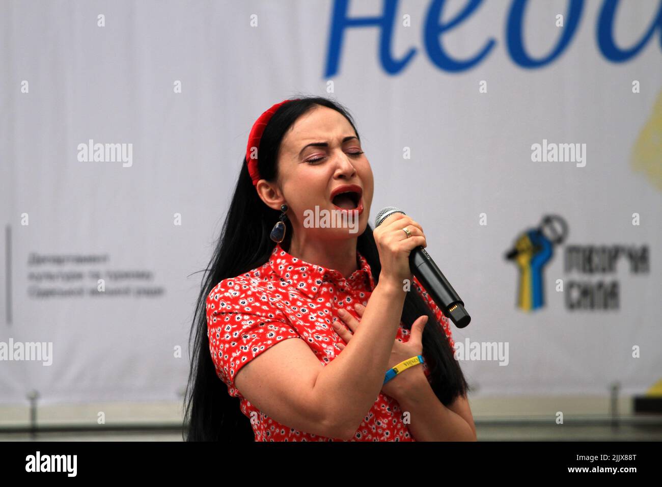 Odessa, Ukraine. 24th July, 2022. The singer Odette Imperiale seen performing in Odessa region during the event. Multicultural poetic and vocal evening 'The ark of inspiration.' Poems and songs in Ukrainian, Polish, English, German, Spanish and French. A monitor was installed for the audience with the translation of works. The goal was to support the civilian population during the war with Russia. (Photo by Viacheslav Onyshchenko/SOPA Images/Sipa USA) Credit: Sipa USA/Alamy Live News Stock Photo