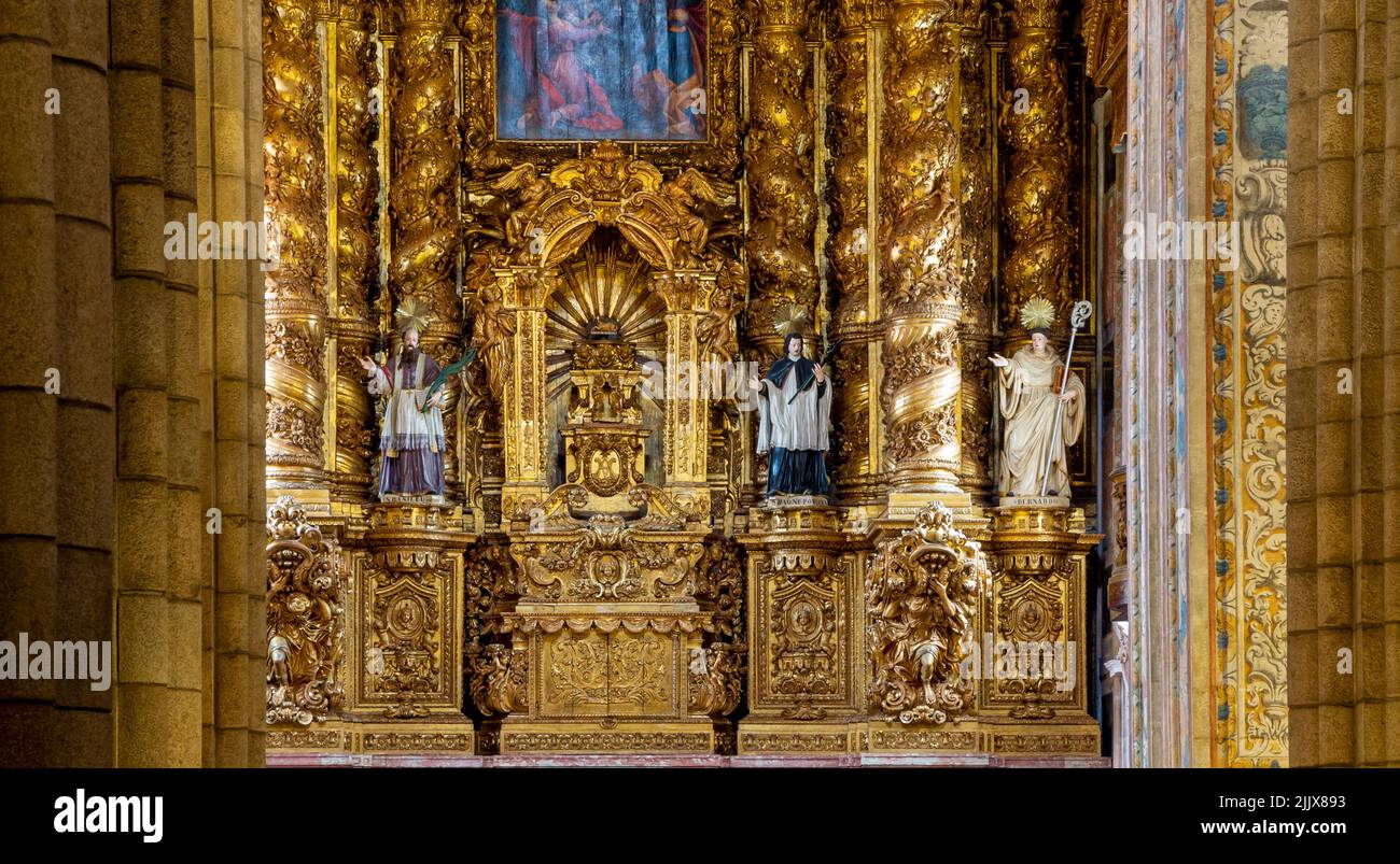 Gilded Baroque main altar in Se do Porto the historic cathedral in the centre of Porto a city in northern Portugal. Stock Photo