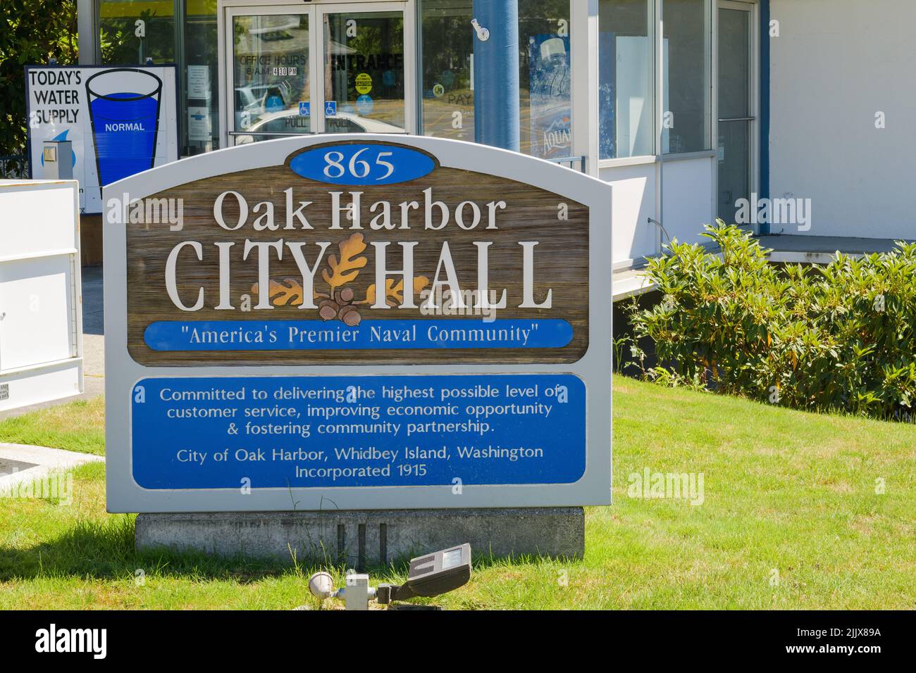 Oak Harbor, WA, USA - July 25, 2022; Wooden sign at Oak Harbor City Hall on Whidbey Island Washington Stock Photo