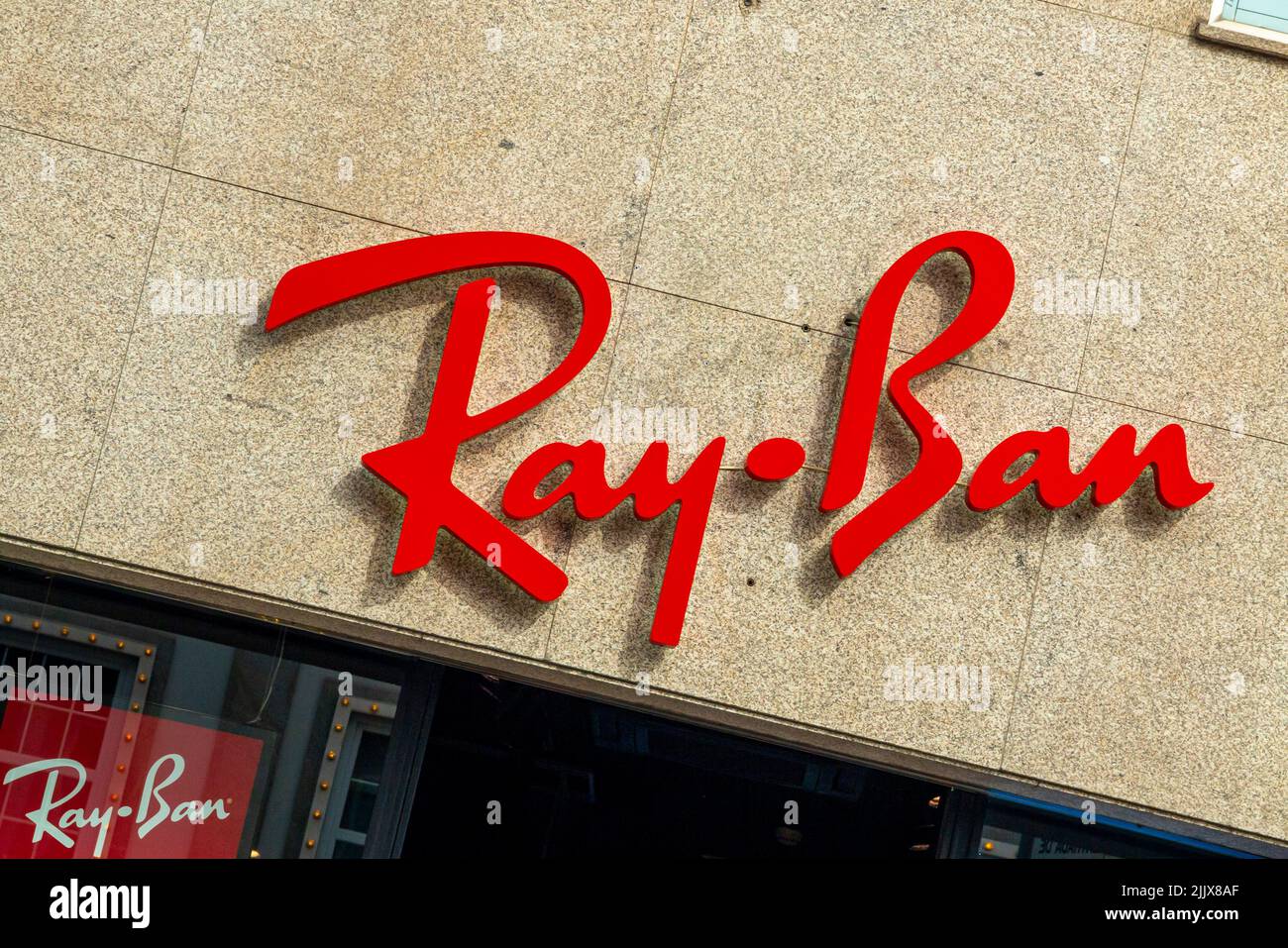 Sign outside Ray Ban sunglasses and eyewear shop in the centre of Porto a major city in northern Portugal. Stock Photo