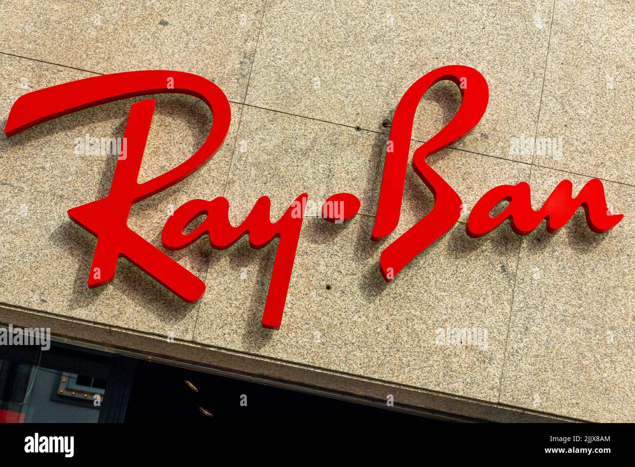 Sign outside Ray Ban sunglasses and eyewear shop in the centre of Porto a major city in northern Portugal. Stock Photo