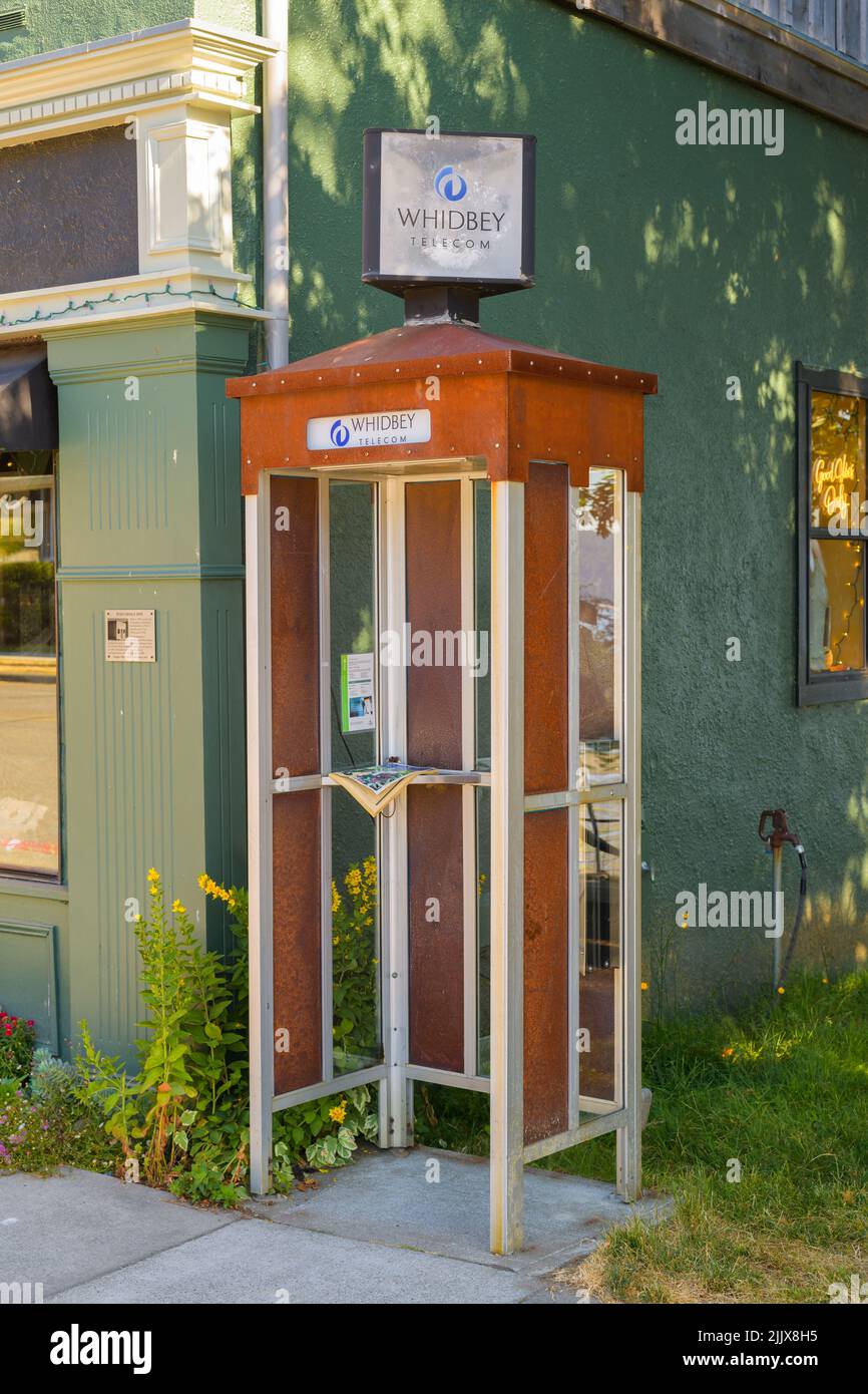 Langley, WA, USA - July 25, 2022; Operational Whidbey Telecom phone booth in 2022 in Langley Washington Stock Photo