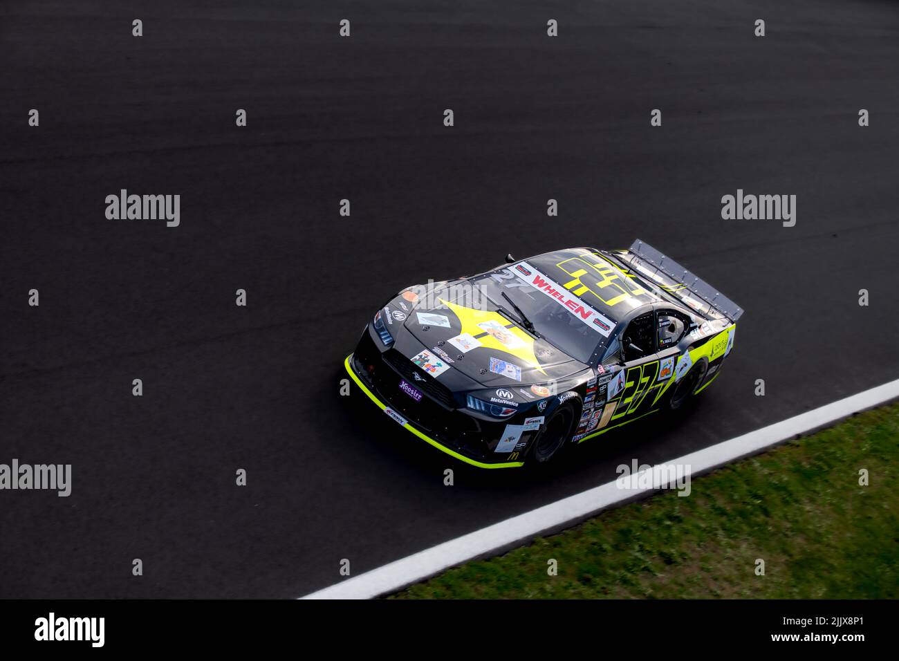 Nascar car action high angle view on asphalt racetrack. Vallelunga, Italy, october 29 2021, American festival of Rome Stock Photo