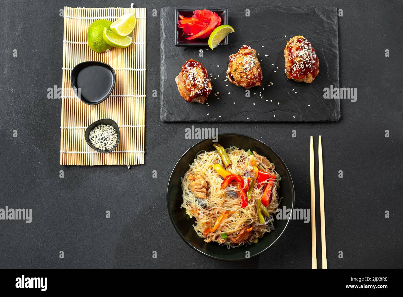 Rice noodles or crystal with other Asian food on a dark background
