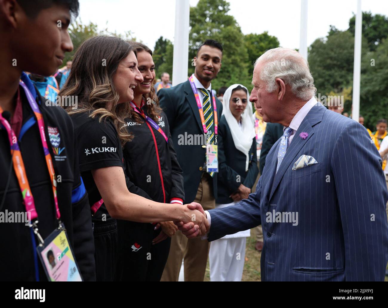 The Prince of Wales talks with athletes from Canada and Pakistan during a visit to the Athletes Village at the University of Birmingham at the Birmingham 2022 Commonwealth Games. Picture date: Thursday July 28, 2022. Stock Photo