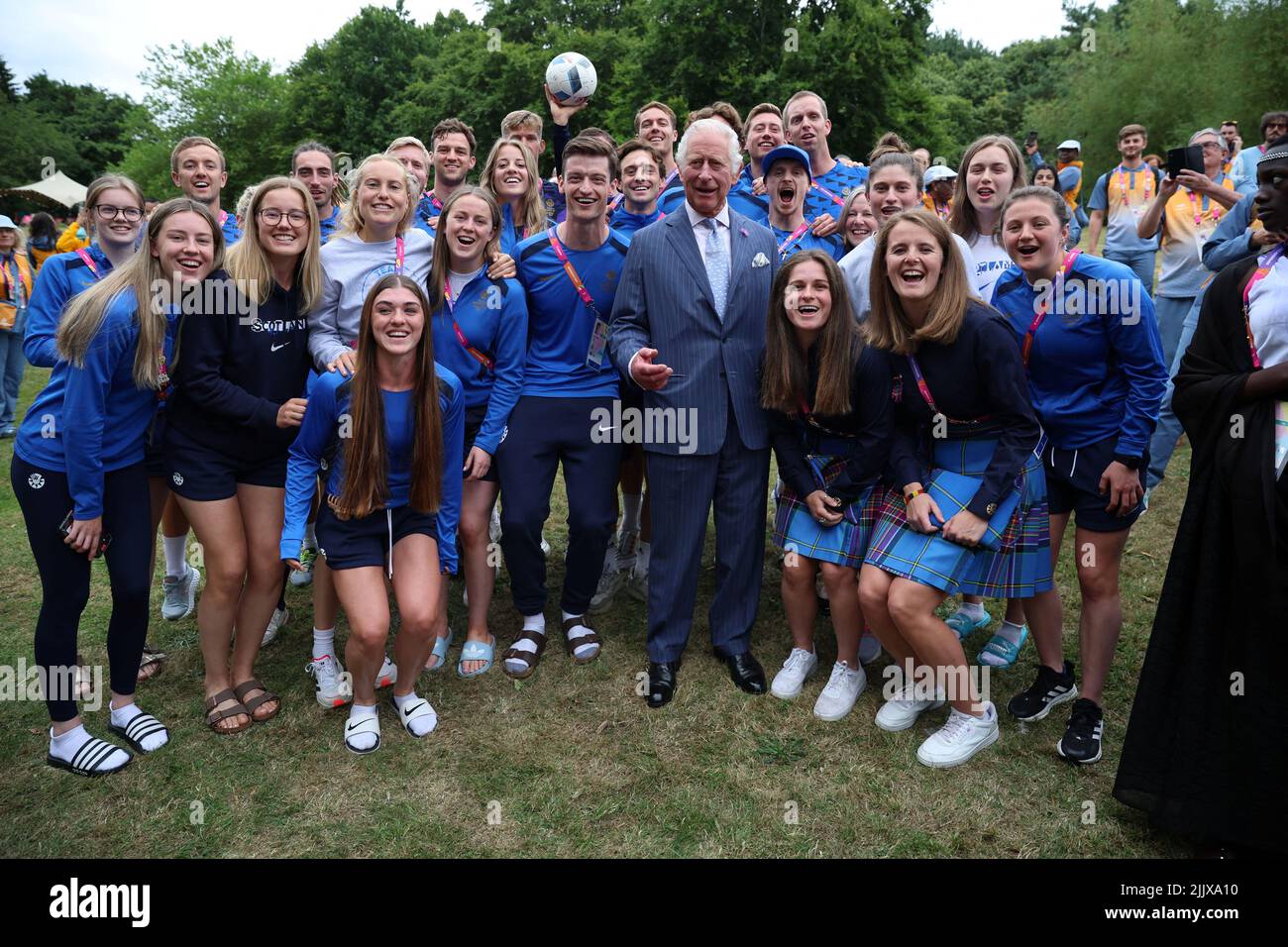 The Prince of Wales poses with athletes from Scotland during a visit to the Athletes Village at the University of Birmingham at the Birmingham 2022 Commonwealth Games. Picture date: Thursday July 28, 2022. Stock Photo