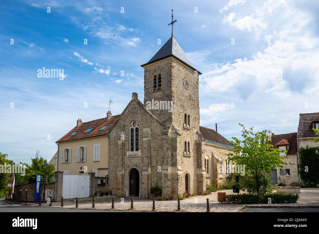 Exterior view of the Saint-Eustache Catholic Church, built in 1699 in meuliere stone, located in Les Loges-en-Josas, France Stock Photo