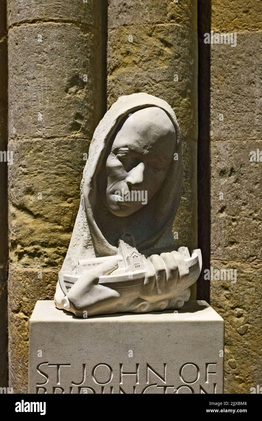 Modern sculpture of St John of Bridlington Priory in the Priory Church of St Mary in Old Bridlington in Yorkshire Stock Photo