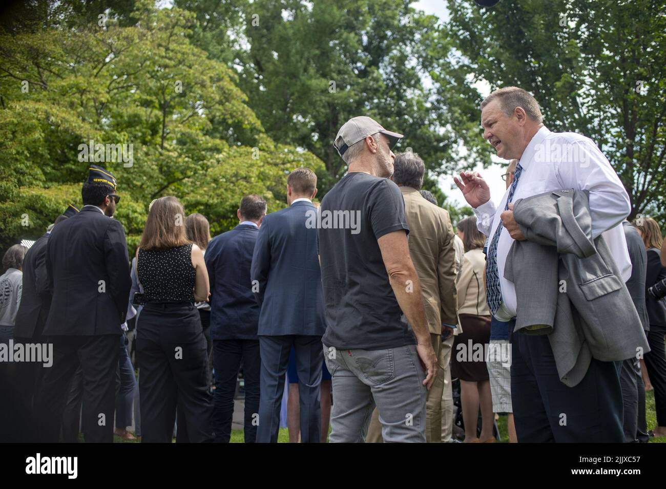 John Stewart, former host of The Daily Show, and Sen. Jon Tester, DMT
