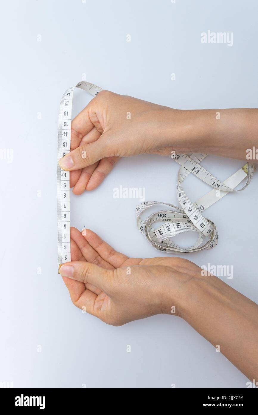 Tape measure to measure various body parts Stock Photo