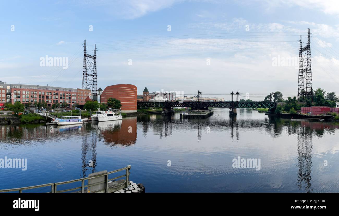NORWALK, CT, USA - JULY 28, 2022: Panorama view feom bridge with Natirime Aquarium and Norwak River in downtown Stock Photo