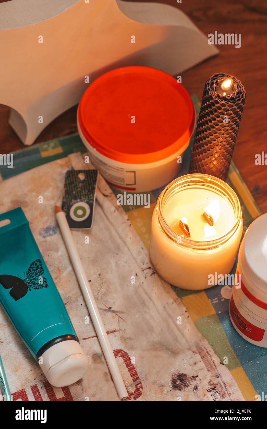Creative space with burning candles. Candles at work Stock Photo Alamy