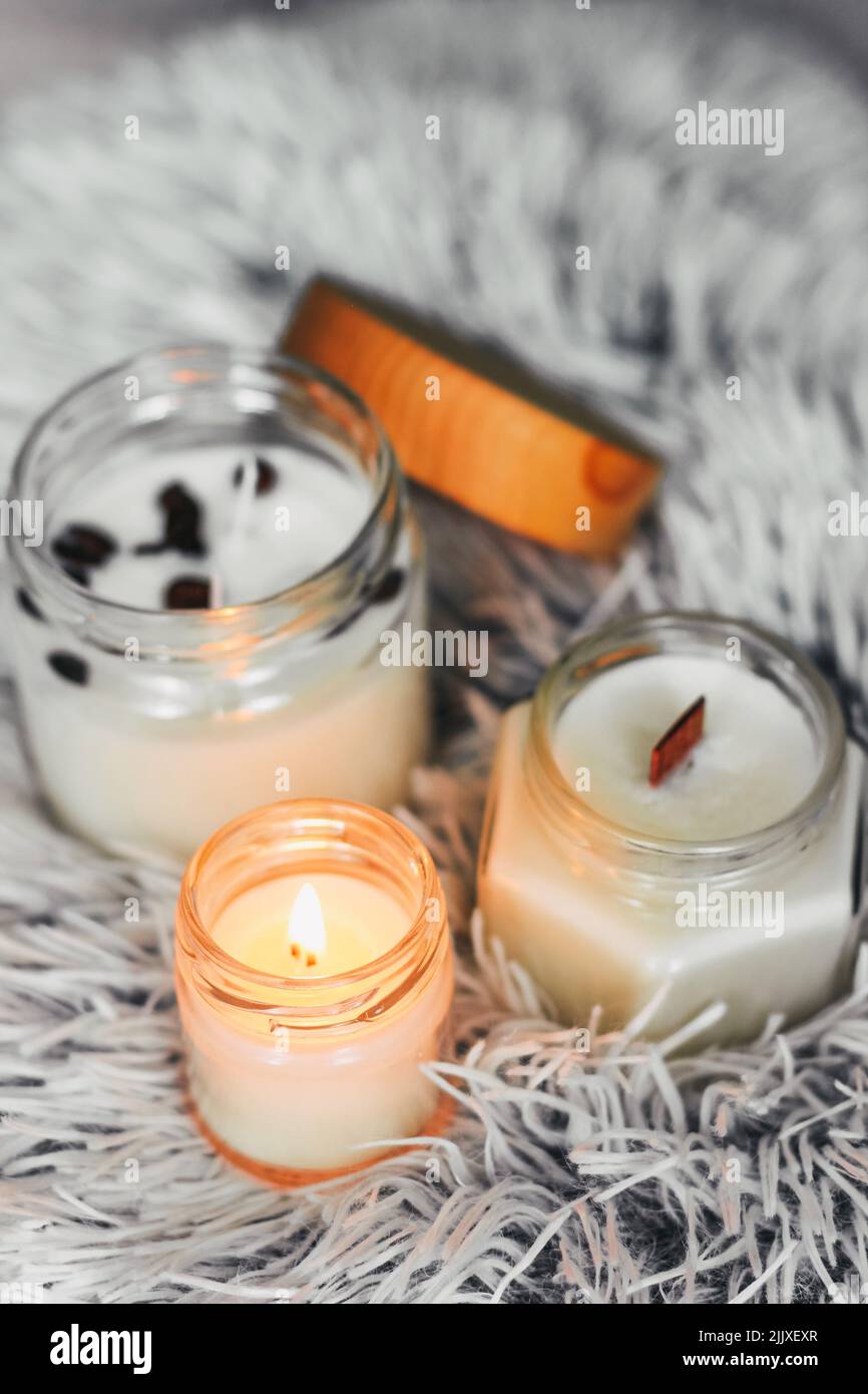 Scented candles in the interior. Interior details in milky and cold