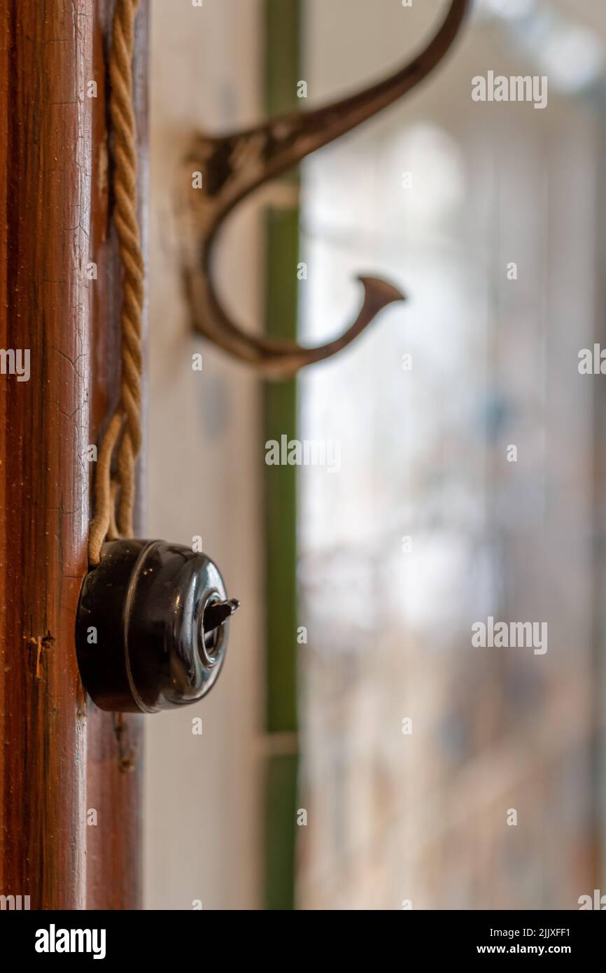 old wall switch coat rack, antique, vertical Stock Photo