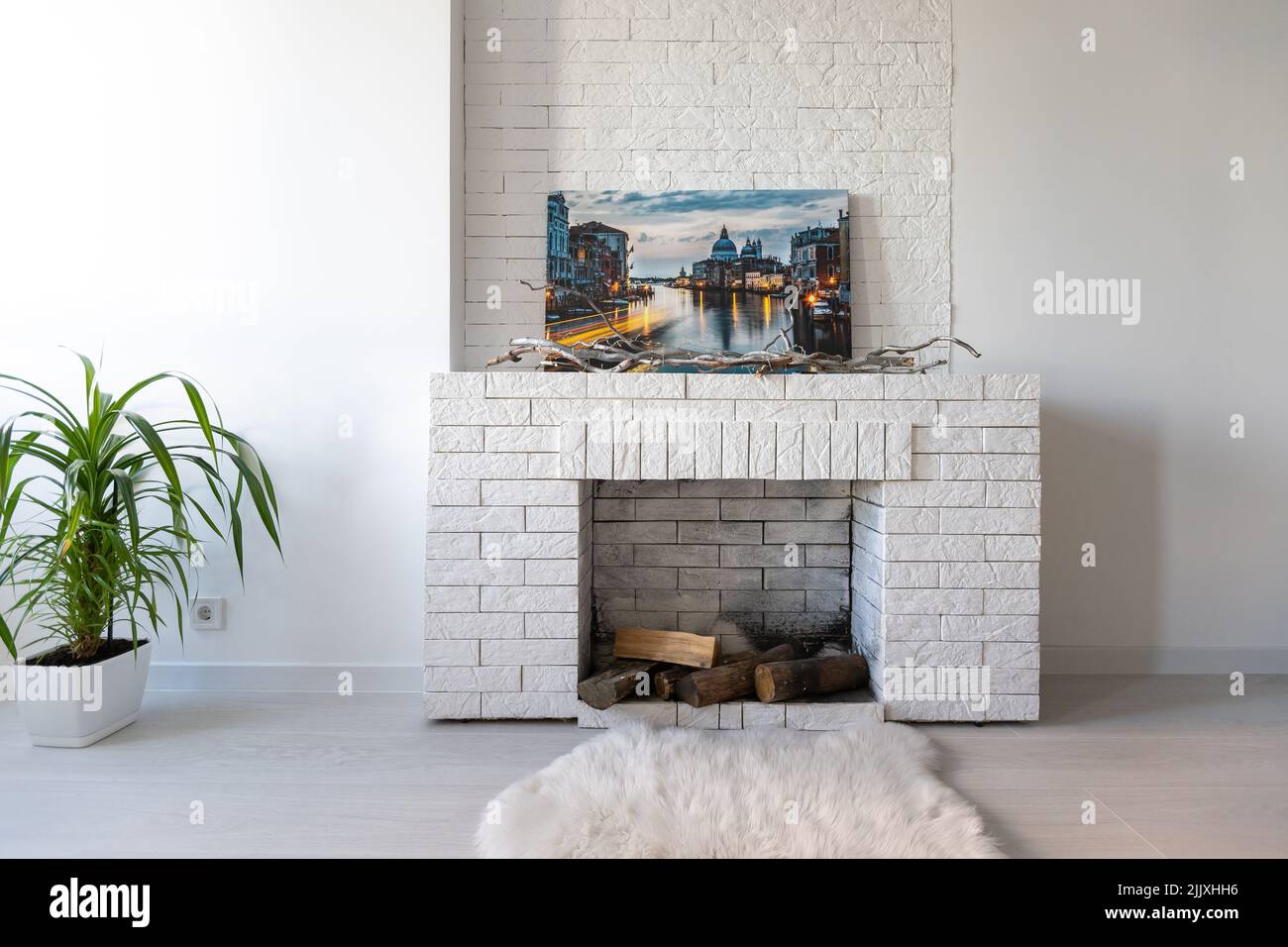 Modern artificial fireplace in the apartment Stock Photo Alamy