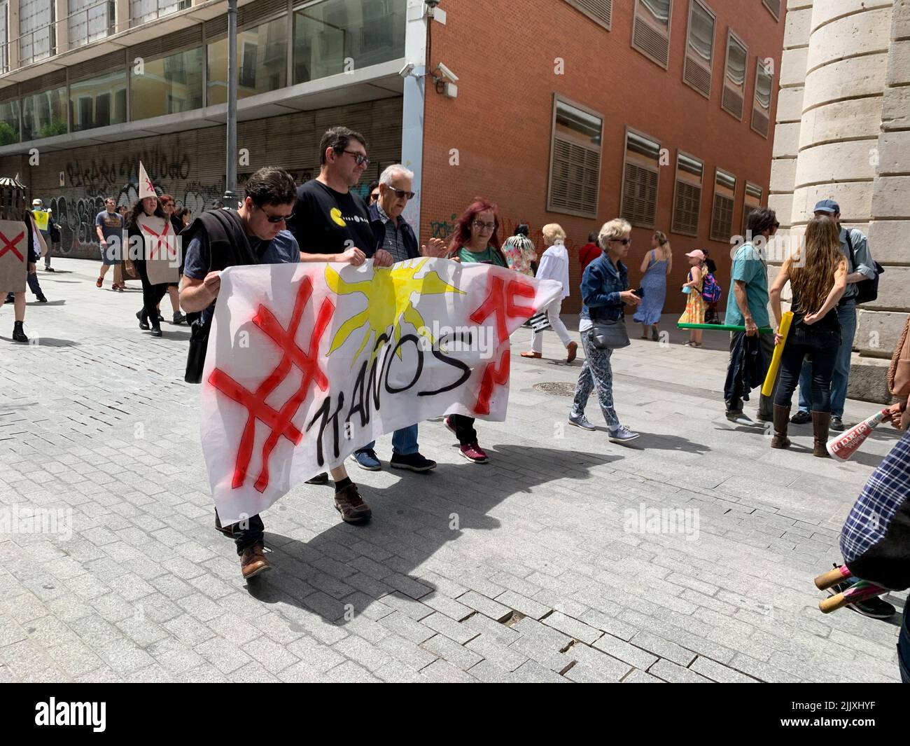 A crowd protesting for social demands in the streets Stock Photo - Alamy