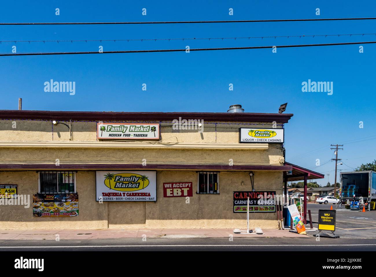 A grocery store catering to the needs of the Mexican farm worker community in the small town of HIlmar California in the Central Valley. Stock Photo
