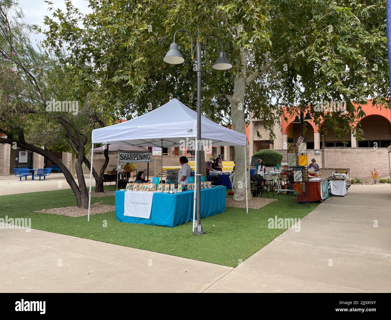 People visit the weekly farmers market in Green Valley, Arizona.  Stock Photo
