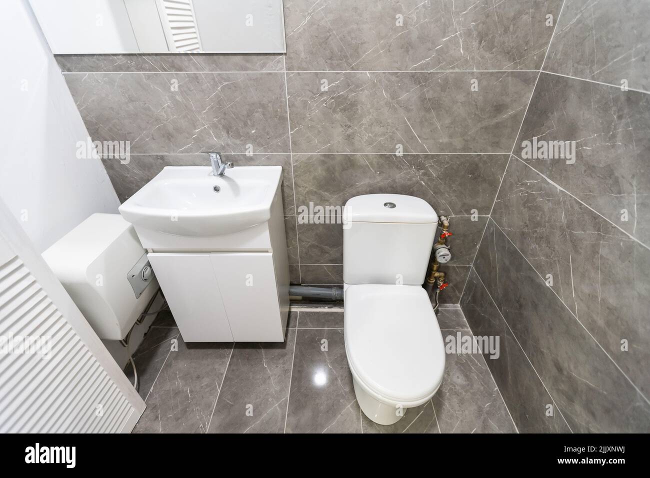 Toilet stall in public restroom Stock Photo Alamy