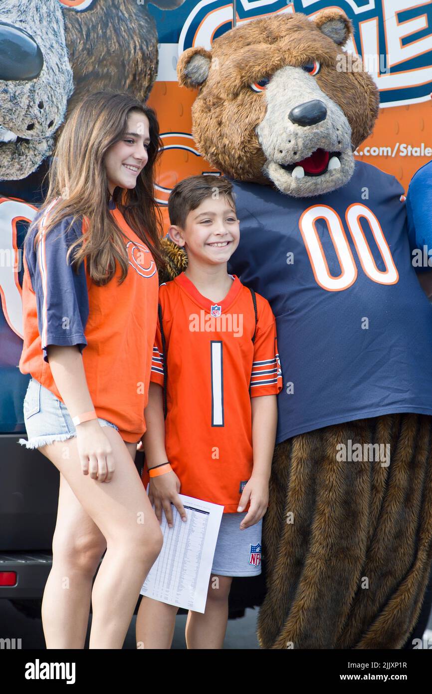 Chicago Bears mascot Staley Da Bear holds up a sign during the