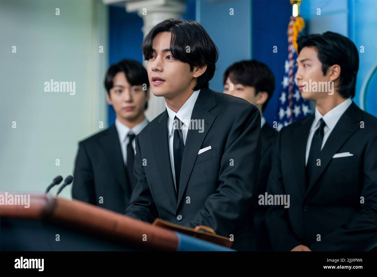 Washington, United States of America. 31 May, 2022. K-Pop band BTS member Kim Tae-hyung, known as V, joins White House Press Secretary Karine Jean-Pierre in the James S. Brady Press Briefing Room of the White House, May 31, 2022, in Washington, D.C. Credit: Erin Scott/White House Photo/Alamy Live News Stock Photo