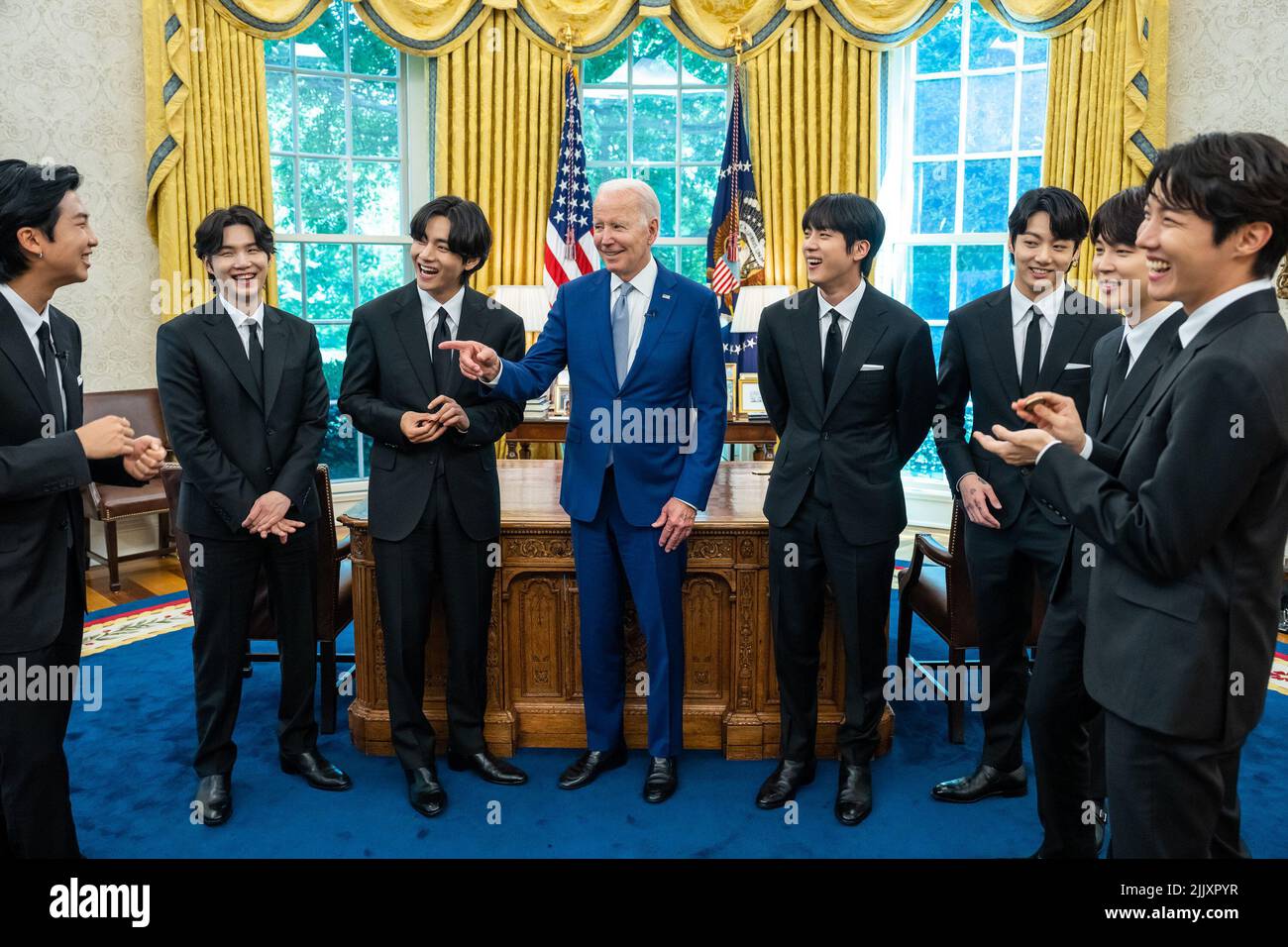 Washington, United States of America. 01 June, 2022. U.S. President Joe Biden chats with members of the K-Pop band BTS in the Oval Office of the White House, May 31, 2022, in Washington, D.C. Credit: Adam Schultz/White House Photo/Alamy Live News Stock Photo