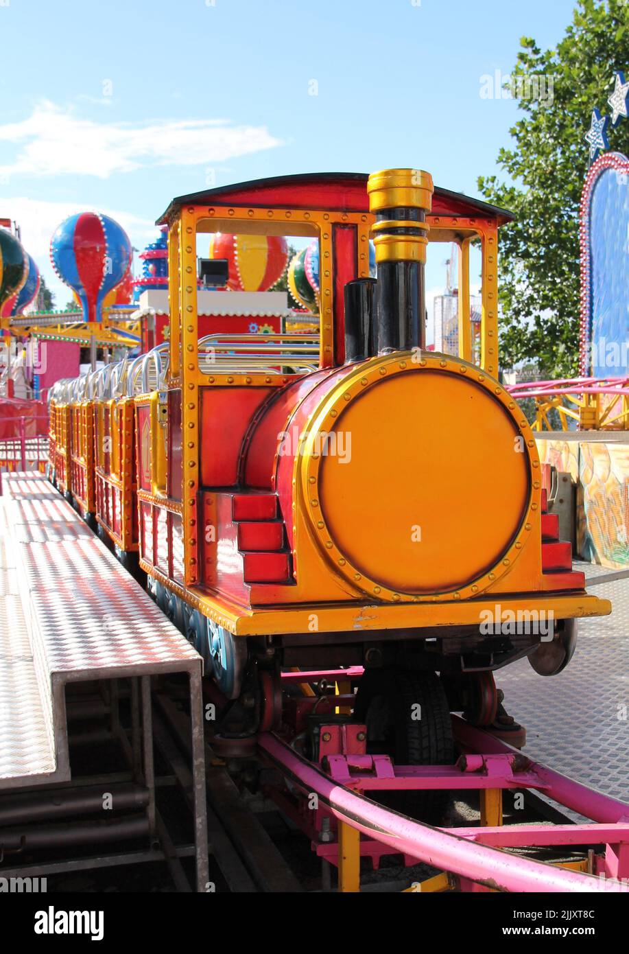 A Childrens Train Ride at a Fun Fair. Stock Photo