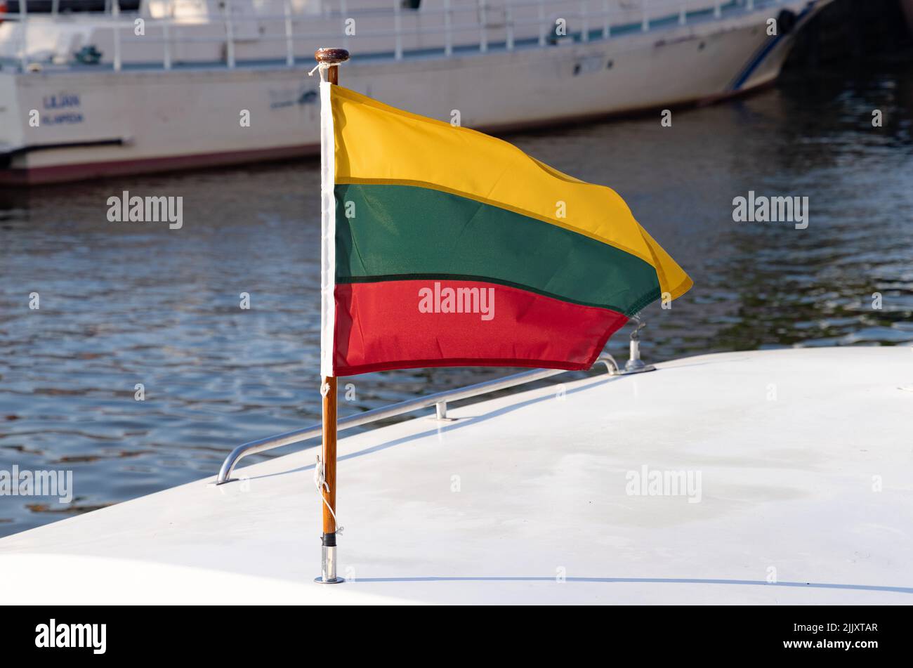 Lithuania flag; the lithuanian flag flying in Klaipeda harbour, Lithuania, Baltic States, Europe Stock Photo