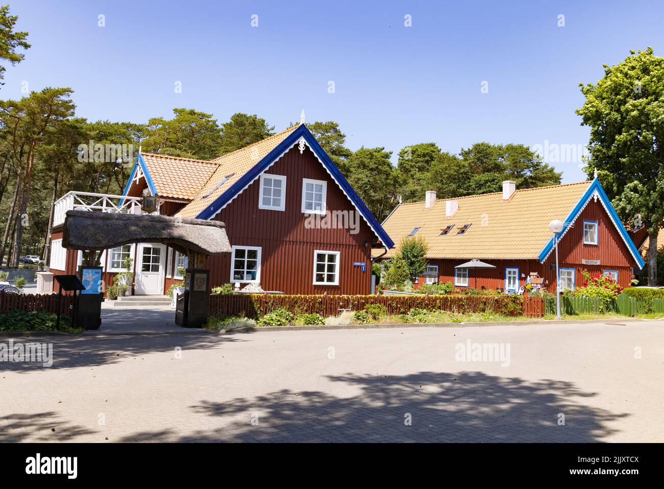 Nida Lithuania; traditional Lithuanian wooden fishermens' houses, Nida village, Nida, Neringa, Curonian Spit, Lithuania Europe Stock Photo