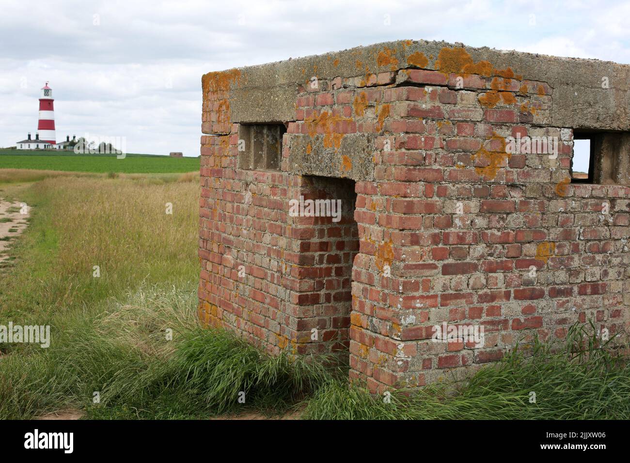 A pillbox defence building with the red and white candy striped