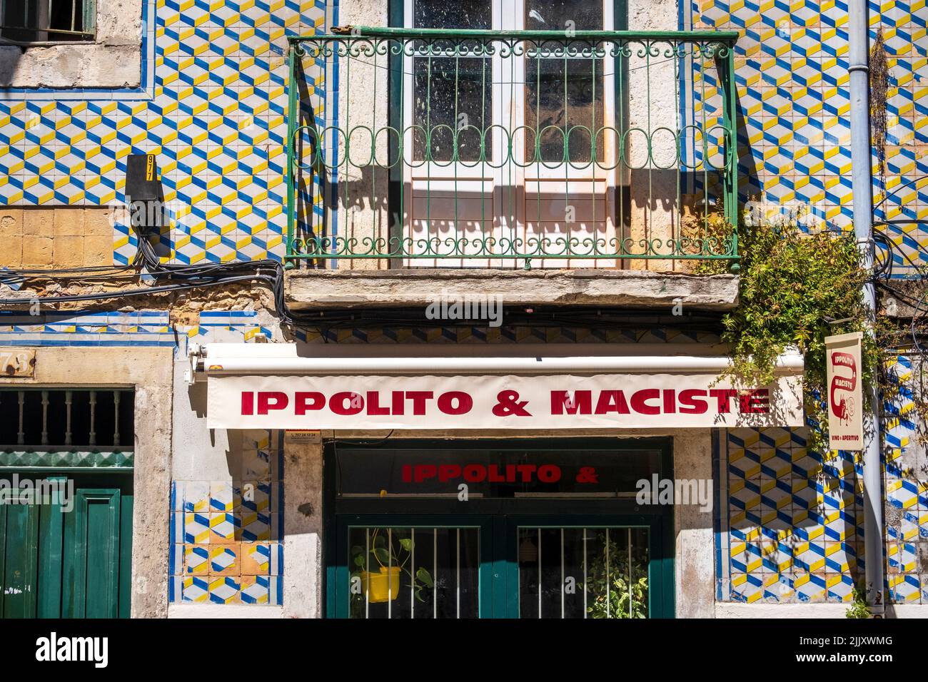 Colorful exterior tilework at Ippolito & Maciste Wine Bar, Lisbon, Portugal Stock Photo
