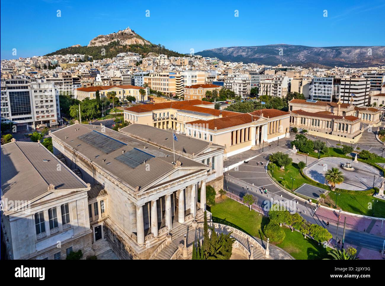 Aerial view of the 'Neoclassical Trilogy' , the National Library, the old University and the Academy on Panepistimiou str., Athens, Greece. Stock Photo