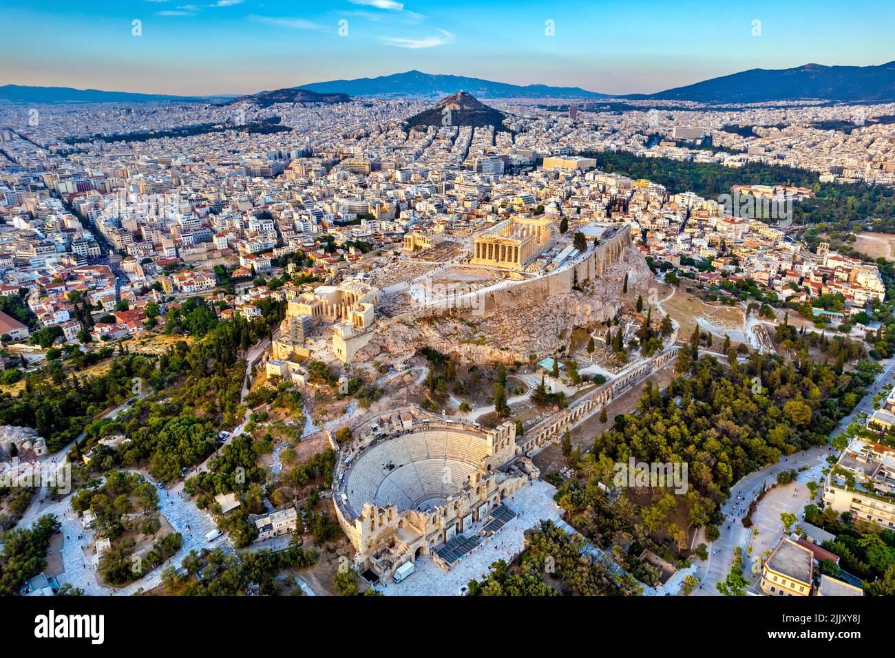 Aerial view of the Acropolis of Athens (Greece). You can also see large part of the city in the background and the Herodeum below. Stock Photo