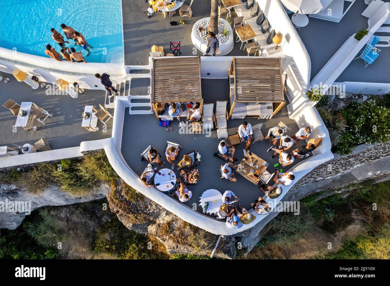 'Katikies Kirini' hotel, 'hangine over the caldera, Perivolas, Oia village, Santorini island, Cyclades, Greece. Stock Photo